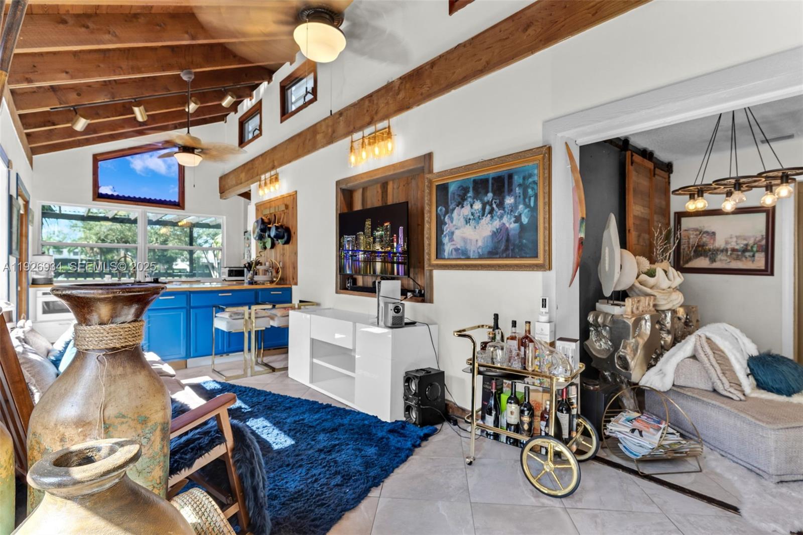 1420 West Sandpiper Circle, Unit 1420 Pembroke Pines, FL 33026 - Photo 10 of 38 a living room with furniture and wooden floor