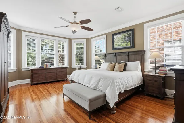 a large kitchen with a table and chairs