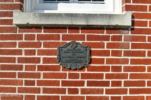 a view of a blue and white wooden cabinets