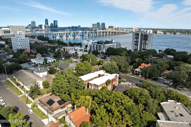 a view of parking garage with cars