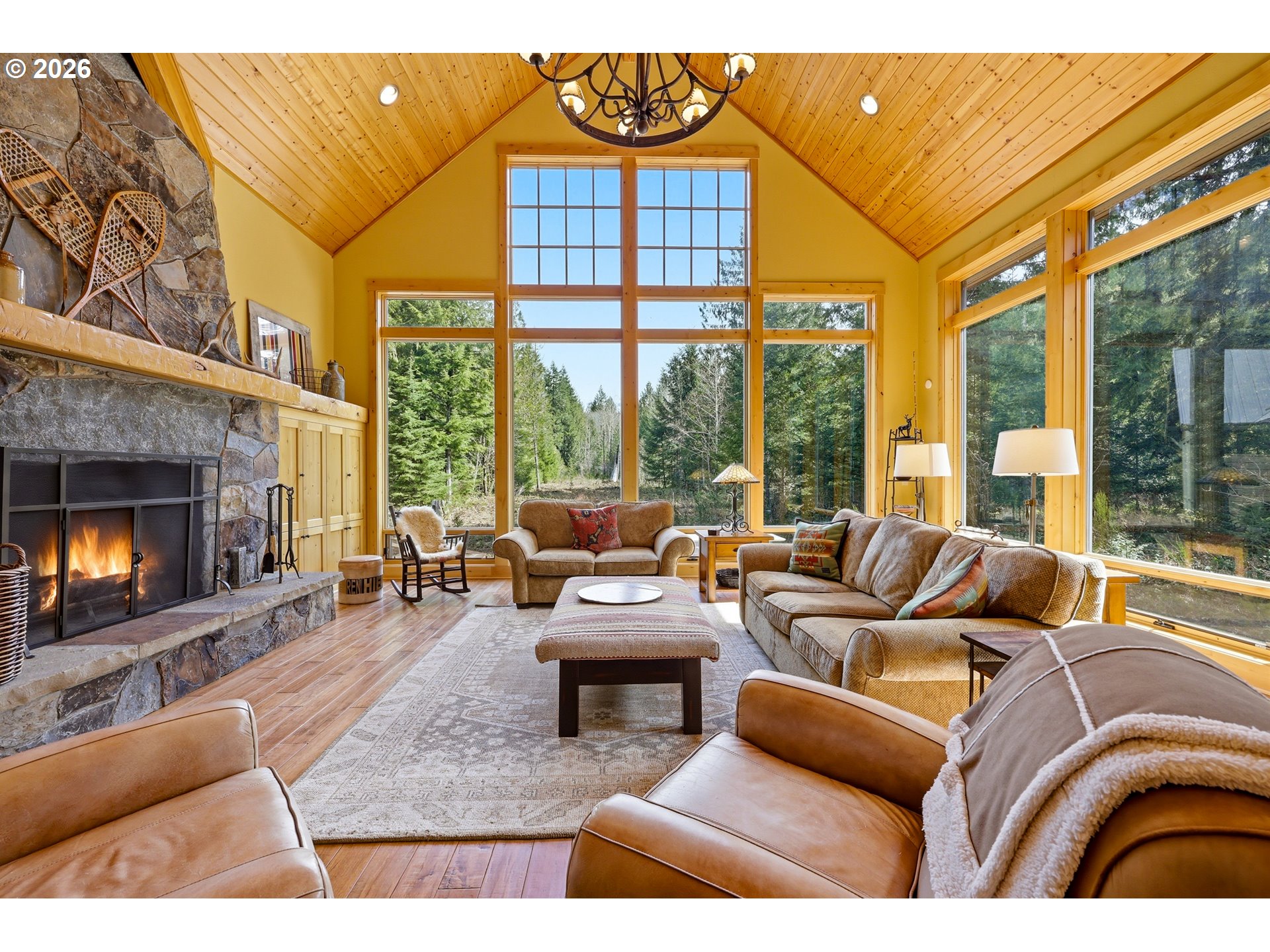 20680 East Glacier View Road Rhododendron, OR 97049 - Photo 16 of 48 a living room with furniture and a fireplace