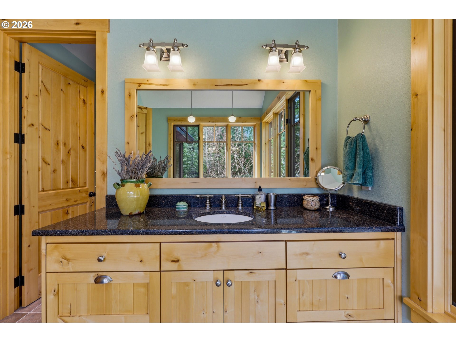 20680 East Glacier View Road Rhododendron, OR 97049 - Photo 28 of 48 a bathroom with a granite countertop sink and a mirror