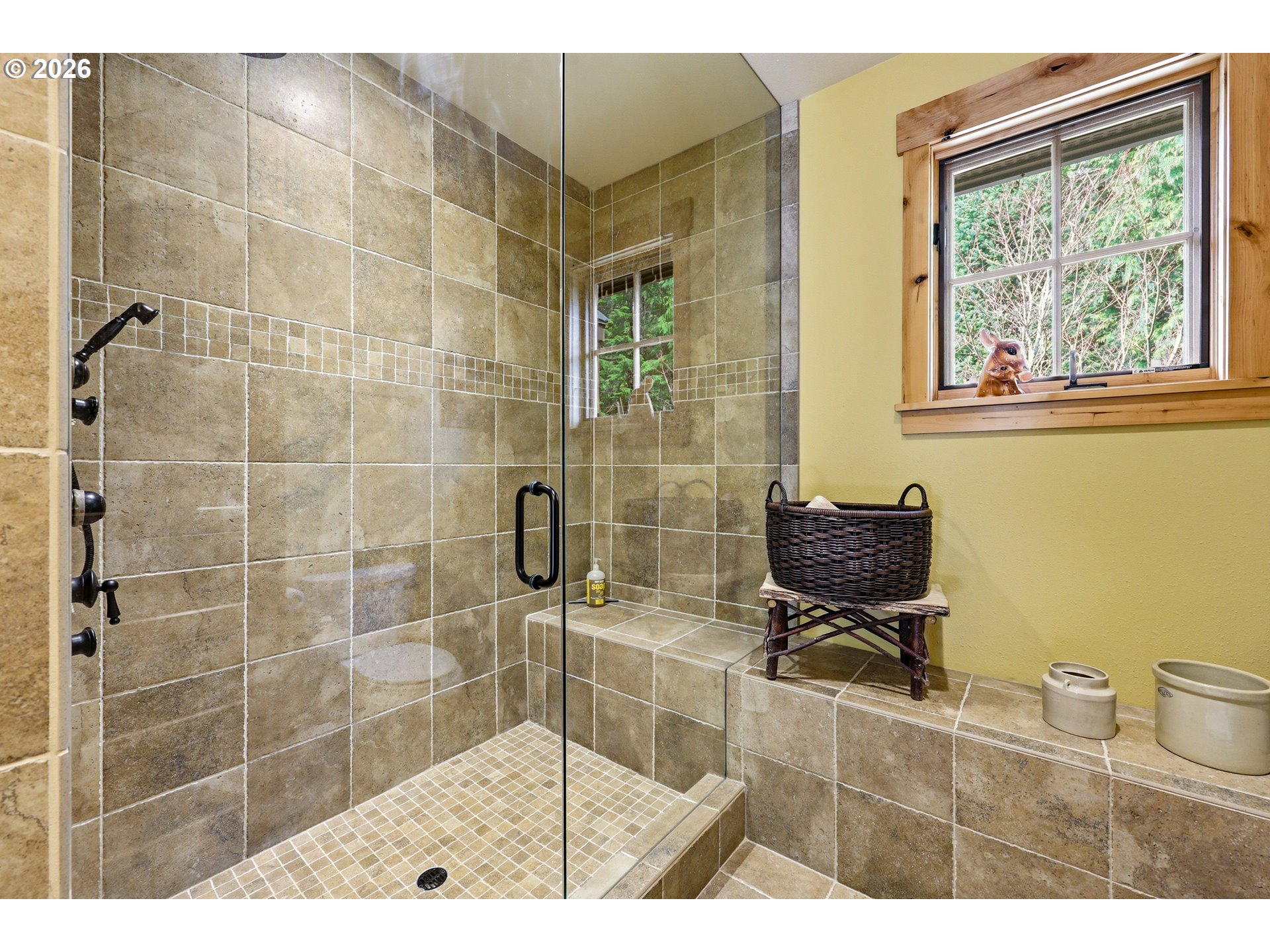20680 East Glacier View Road Rhododendron, OR 97049 - Photo 32 of 48 a bathroom with a window a toilet a sink and shower