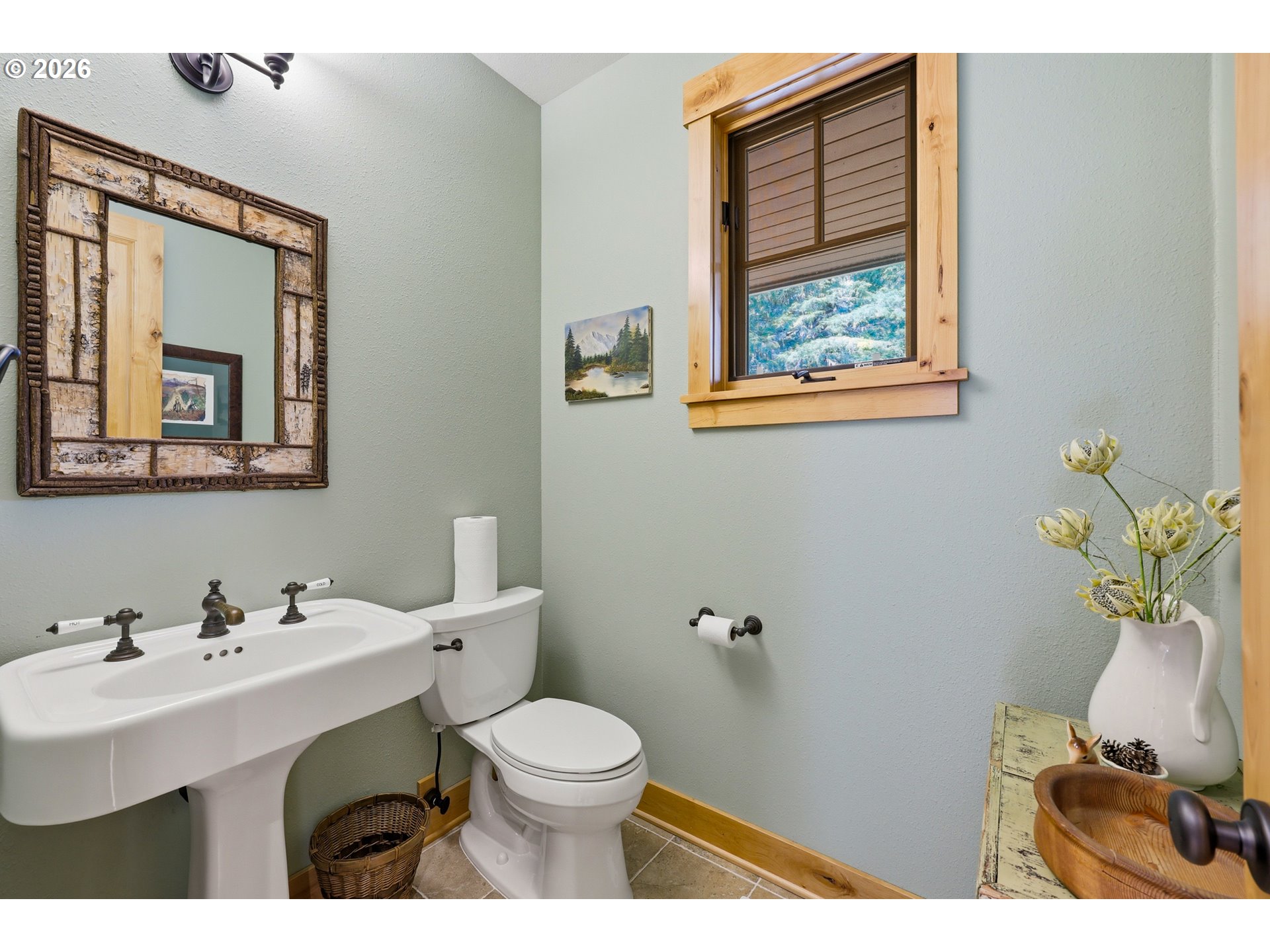 20680 East Glacier View Road Rhododendron, OR 97049 - Photo 35 of 48 a bathroom with a toilet sink and mirror