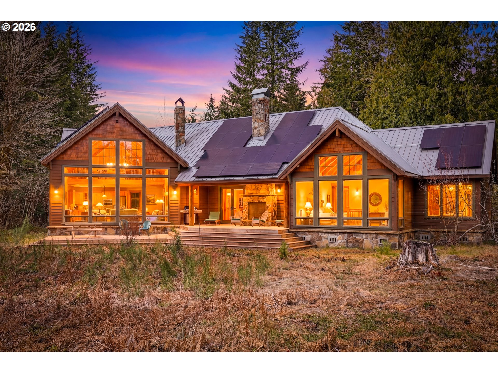 20680 East Glacier View Road Rhododendron, OR 97049 - Photo 39 of 48 a view of an house with a yard