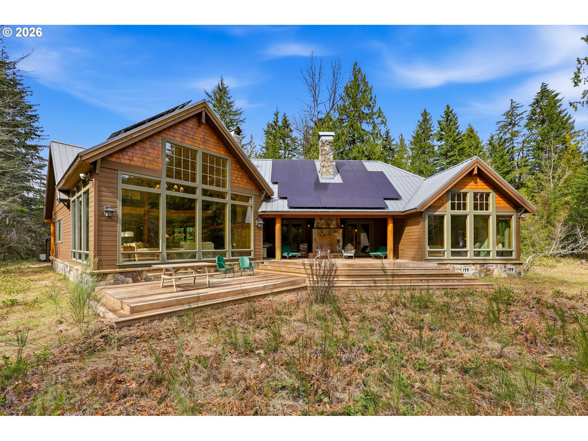 20680 East Glacier View Road Rhododendron, OR 97049 - Photo 40 of 48 a front view of a house with a yard