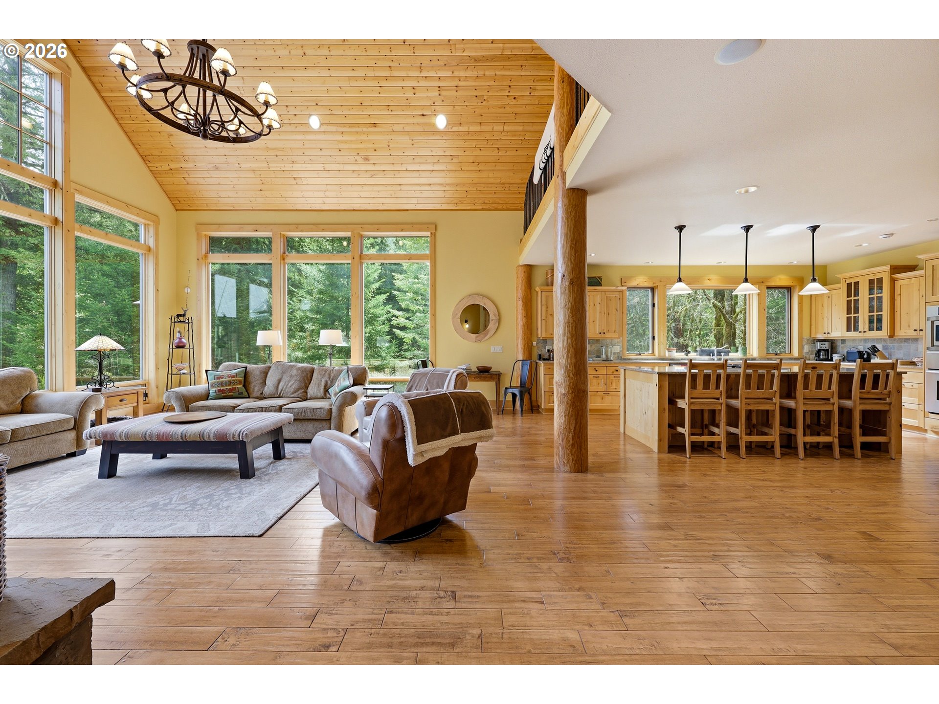 20680 East Glacier View Road Rhododendron, OR 97049 - Photo 7 of 48 a living room with furniture and a large window