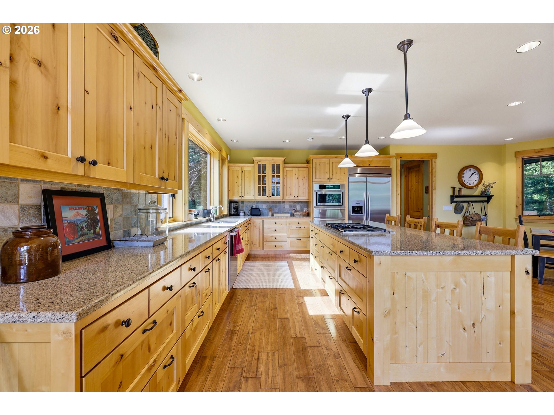 20680 East Glacier View Road Rhododendron, OR 97049 - Photo 9 of 48 a large kitchen with cabinets