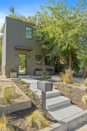 a view of a house with swimming pool