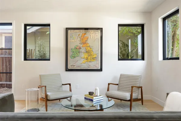 a living room with furniture and a window