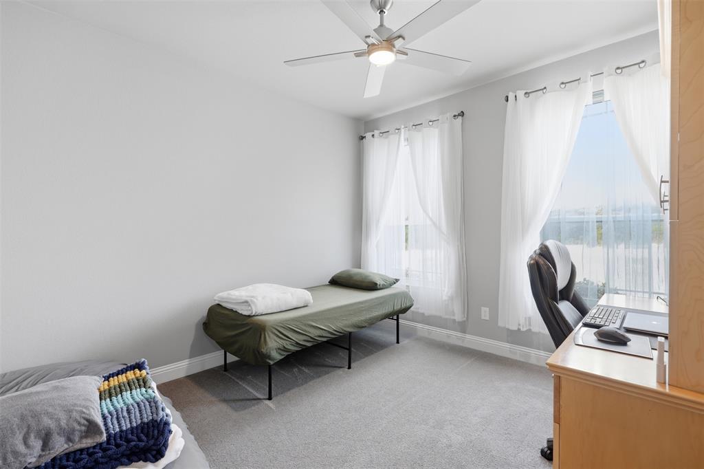 3036 Deer Path Weatherford, TX 76085 - Photo 22 of 35 a living room with furniture and a window