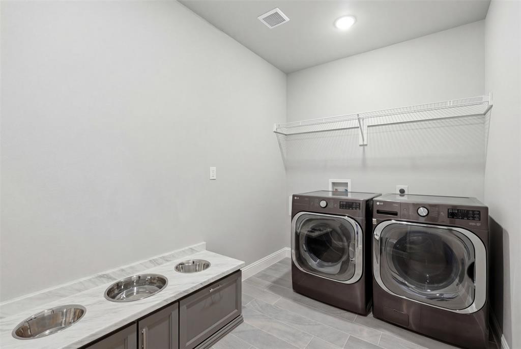 3036 Deer Path Weatherford, TX 76085 - Photo 26 of 35 a utility room with dryer and washer