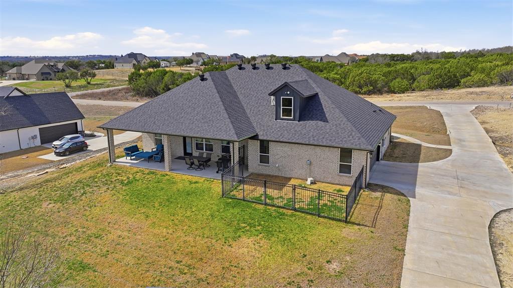 3036 Deer Path Weatherford, TX 76085 - Photo 29 of 35 an aerial view of a house with swimming pool garden and mountain view