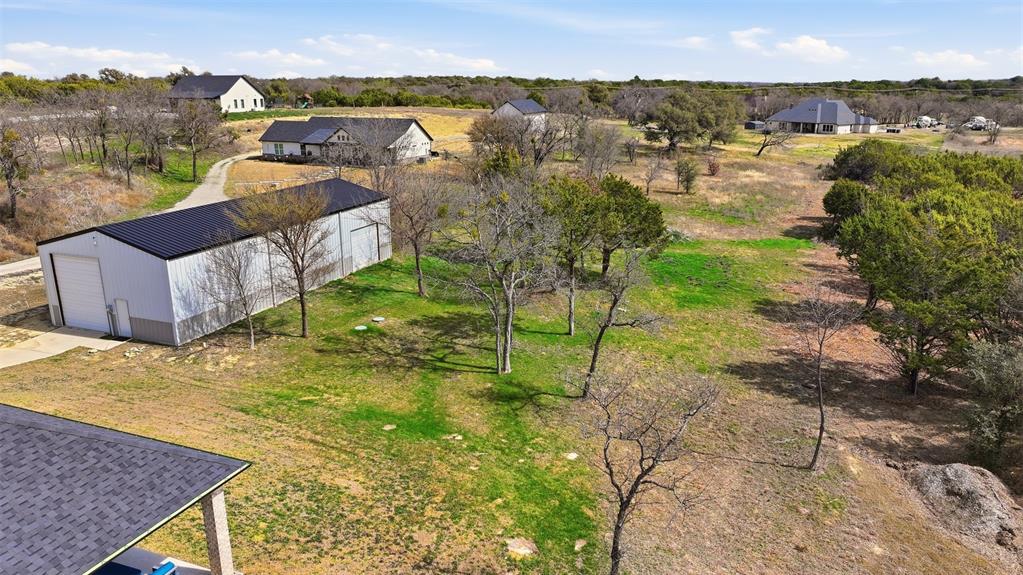 3036 Deer Path Weatherford, TX 76085 - Photo 33 of 35 a view of a lake in middle of the town