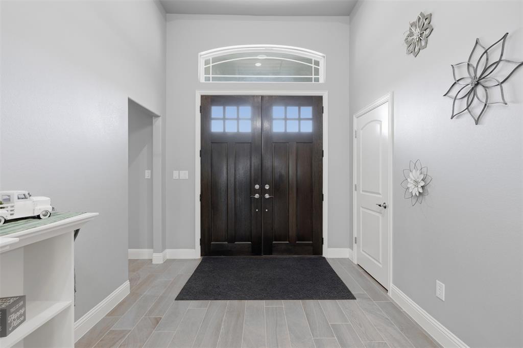 3036 Deer Path Weatherford, TX 76085 - Photo 5 of 35 a view of a bathroom with sink and glass door
