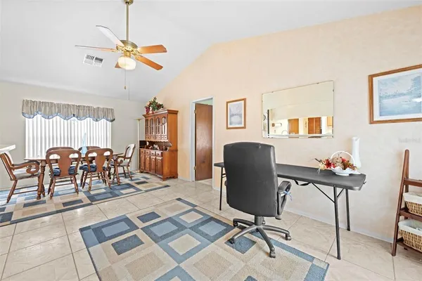 a view of a dining room with furniture