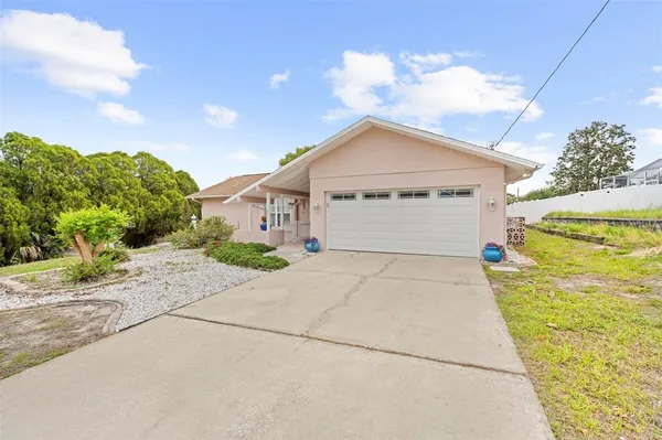 $325,000 | 13378 Drayton Drive, Spring Hill, FL 34609