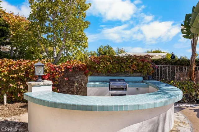 a view of a house with swimming pool and porch