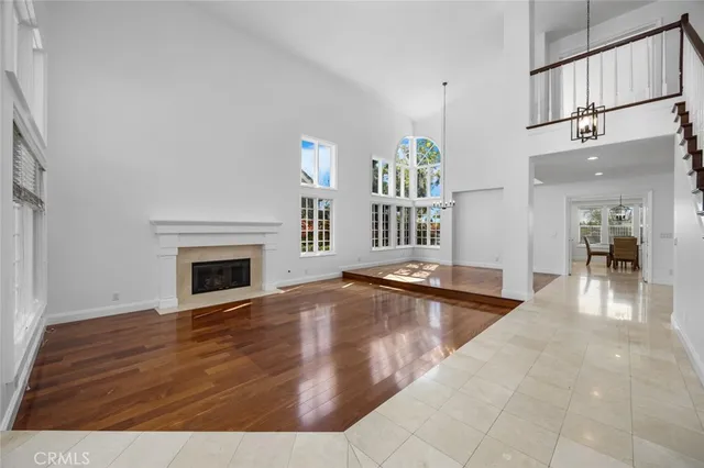 a view of an empty room and fire place