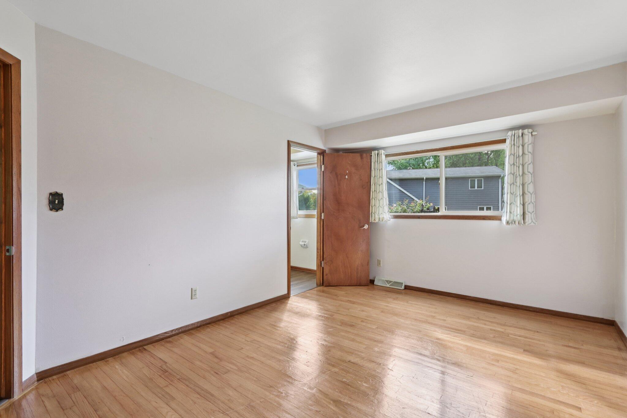 901 Anton Road Hartland, WI 53029 - Photo 20 of 48 Original hardwood floors can be found in all bedrooms.
