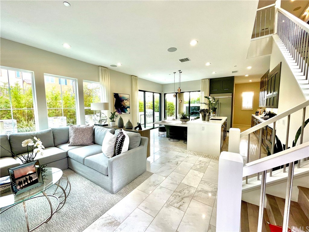 20744 Bur Oak Circle Porter Ranch, CA 91326 - Photo 2 of 36 a living room with furniture and a large window