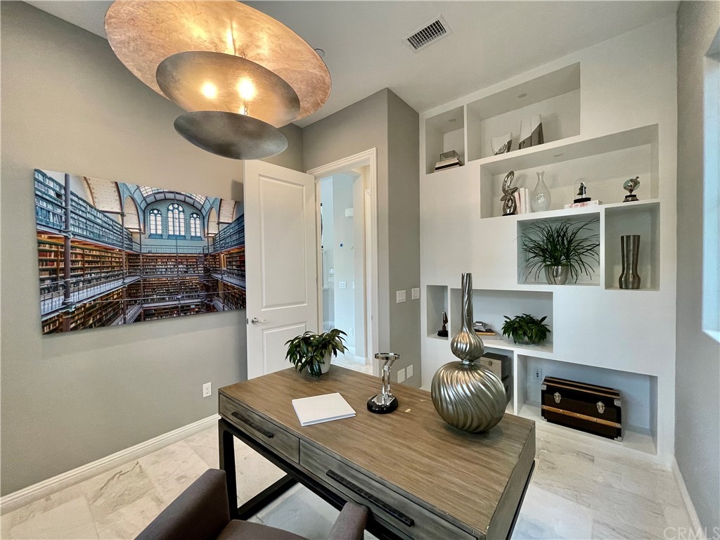 20744 Bur Oak Circle Porter Ranch, CA 91326 - Photo 12 of 36 a view of a dining room with furniture