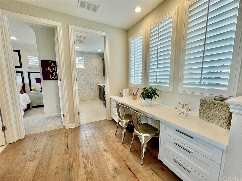 20744 Bur Oak Circle Porter Ranch, CA 91326 - Photo 28 of 36 a bathroom with a sink a mirror and a bathtub