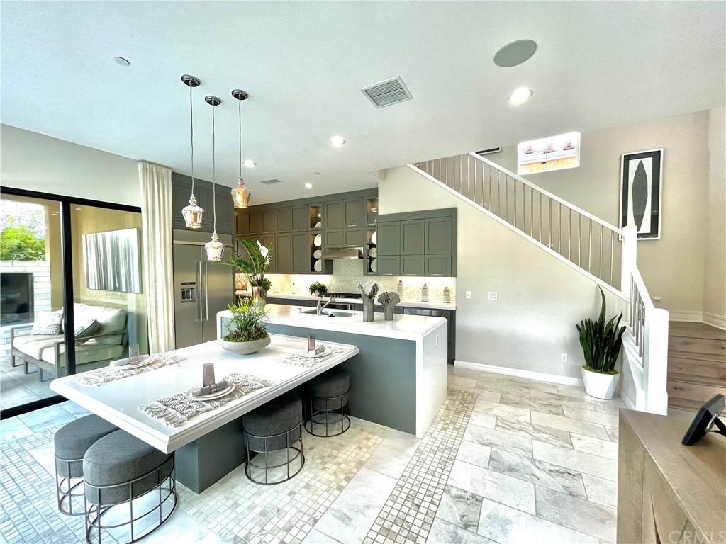 20744 Bur Oak Circle Porter Ranch, CA 91326 - Photo 5 of 36 a kitchen with a table and chairs in it