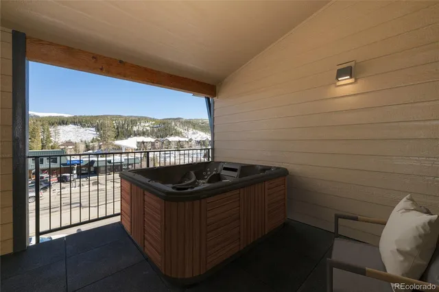 a kitchen with granite countertop a sink and a stove