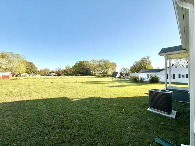 a view of swimming pool with outdoor space and seating area