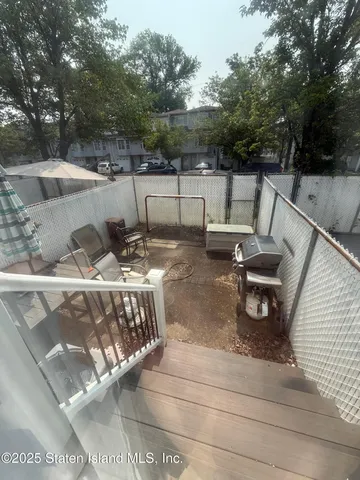 a view of a terrace with sitting area