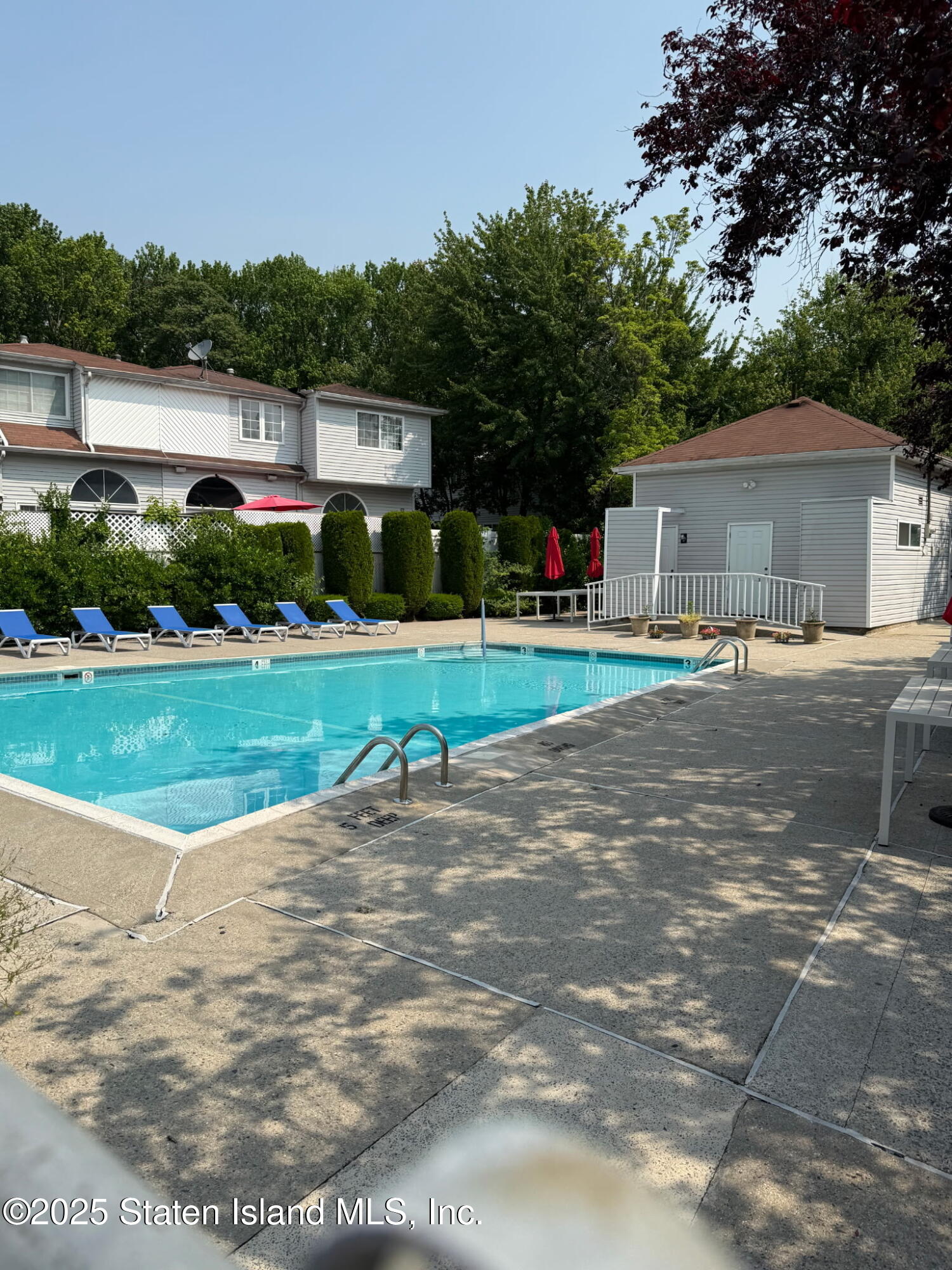 37 Linda Lane Staten Island, NY 10312 - Photo 18 of 20 a front view of house with yard and green space