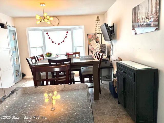a view of a dining room with furniture