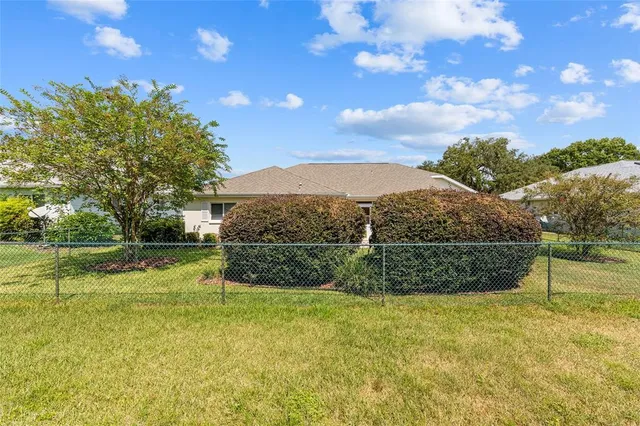 a view of a house with basketball court