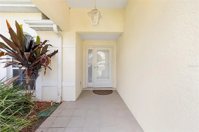 a view of a hallway with a white walls