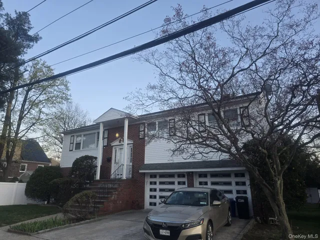 a front view of house with a yard