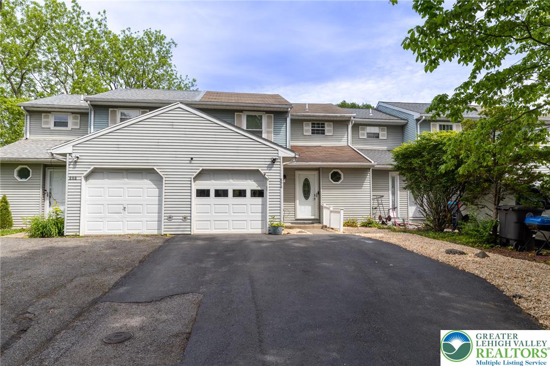 896 Briarstone Road Bethlehem, PA 18017 - Photo 26 of 26 a front view of a house with a yard and garage