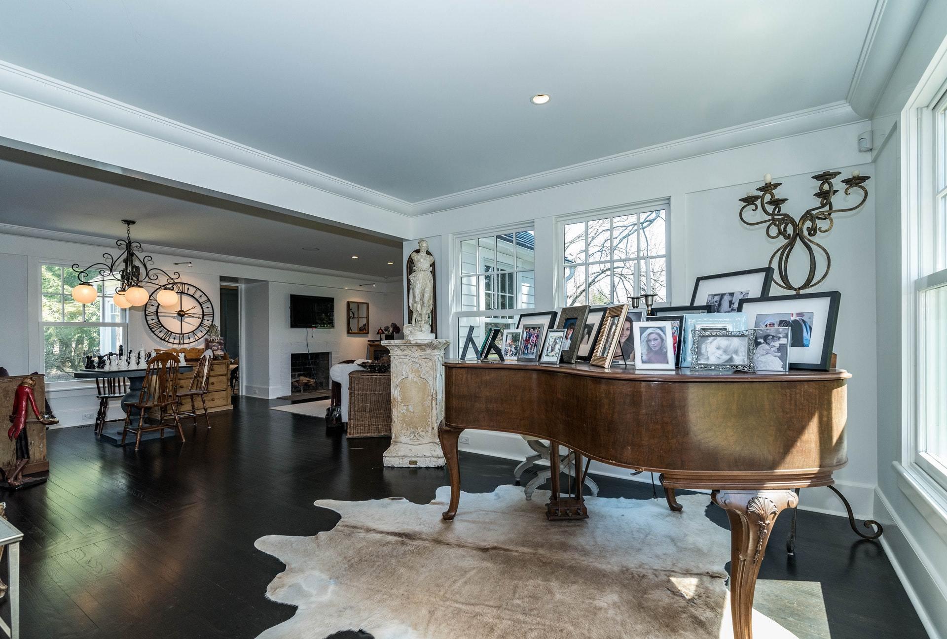947 Valley Road New Canaan, CT 06840 - Photo 18 of 32 a living room with furniture and a large window