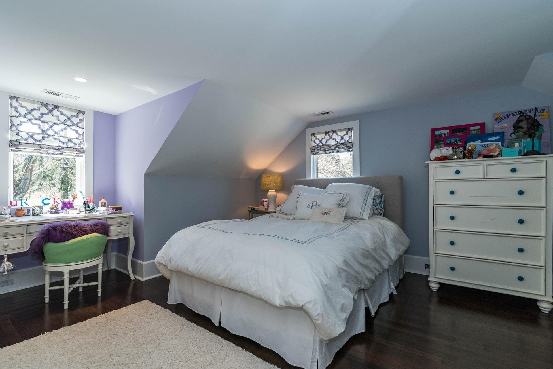947 Valley Road New Canaan, CT 06840 - Photo 24 of 32 a bedroom with a bed chair and window
