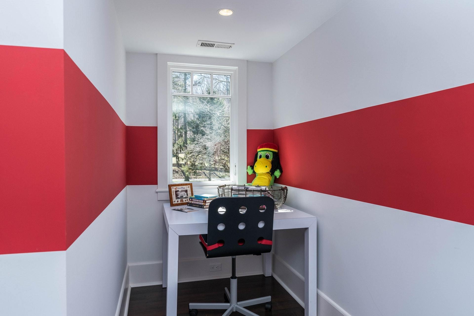 947 Valley Road New Canaan, CT 06840 - Photo 27 of 32 a view of a room with a table and chairs