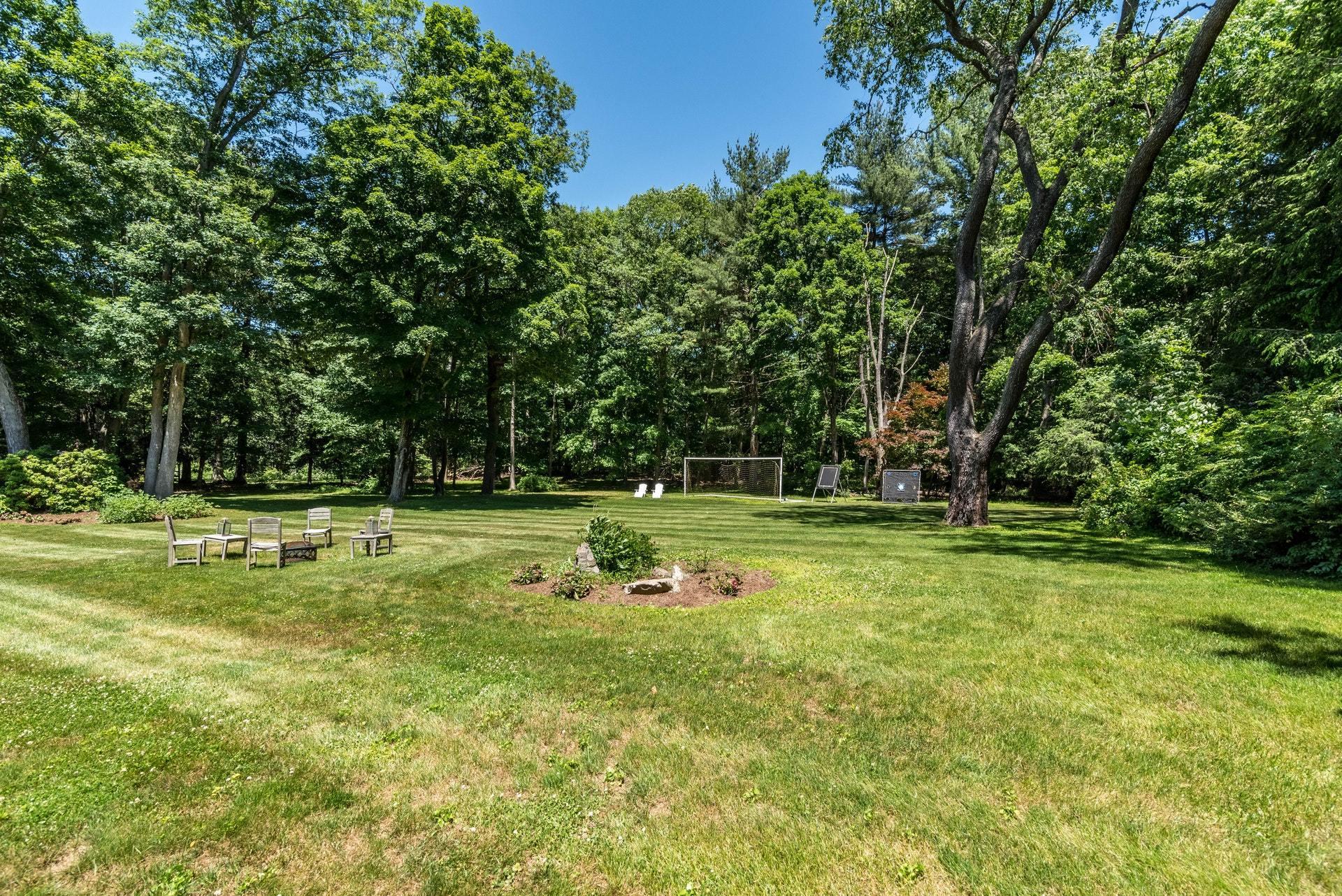 947 Valley Road New Canaan, CT 06840 - Photo 29 of 32 a view of a park with large trees