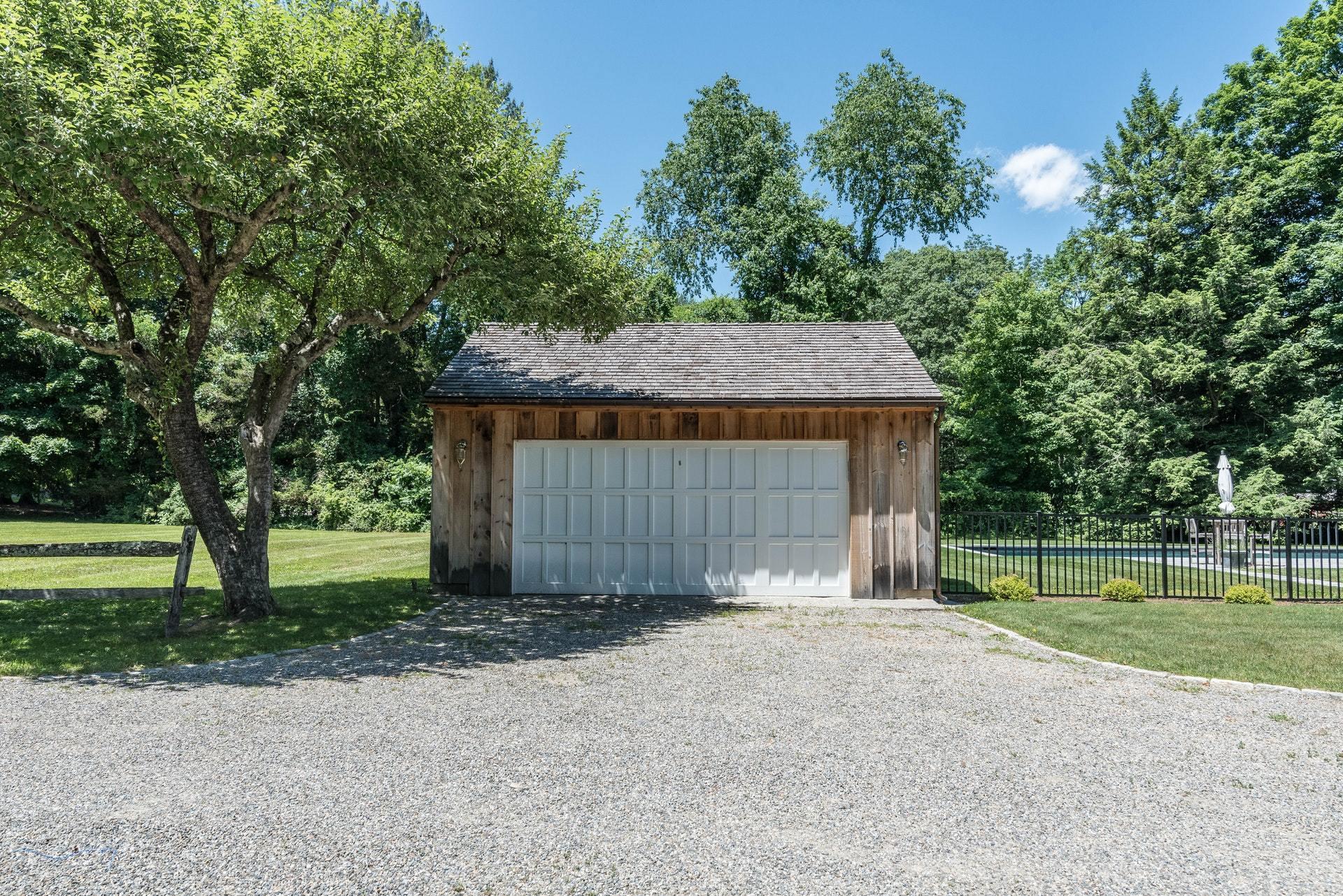 947 Valley Road New Canaan, CT 06840 - Photo 3 of 32 a house with a yard