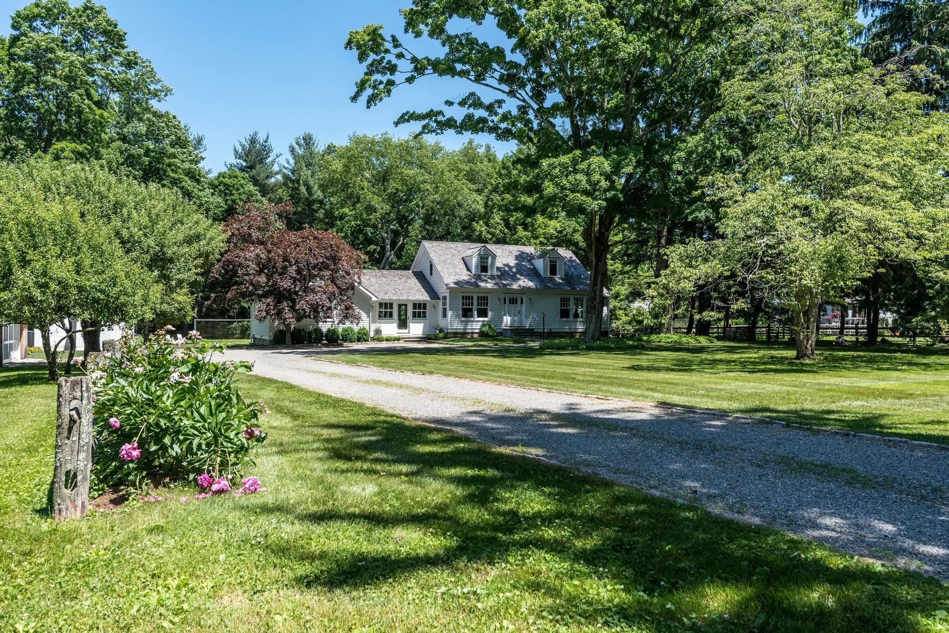 947 Valley Road New Canaan, CT 06840 - Photo 32 of 32 a view of yard with swimming pool and green space
