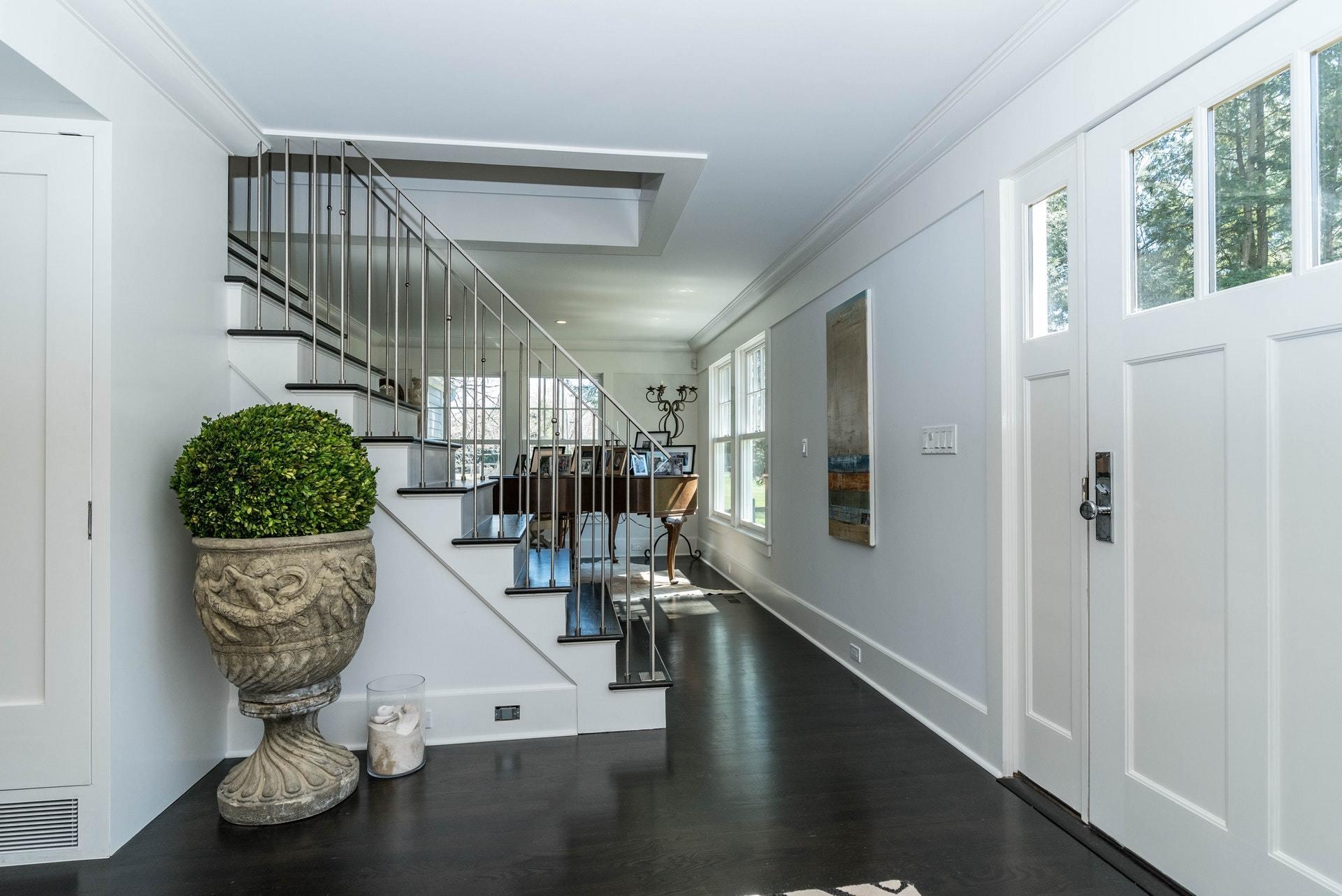 947 Valley Road New Canaan, CT 06840 - Photo 4 of 32 a view of entryway and hall with wooden floor