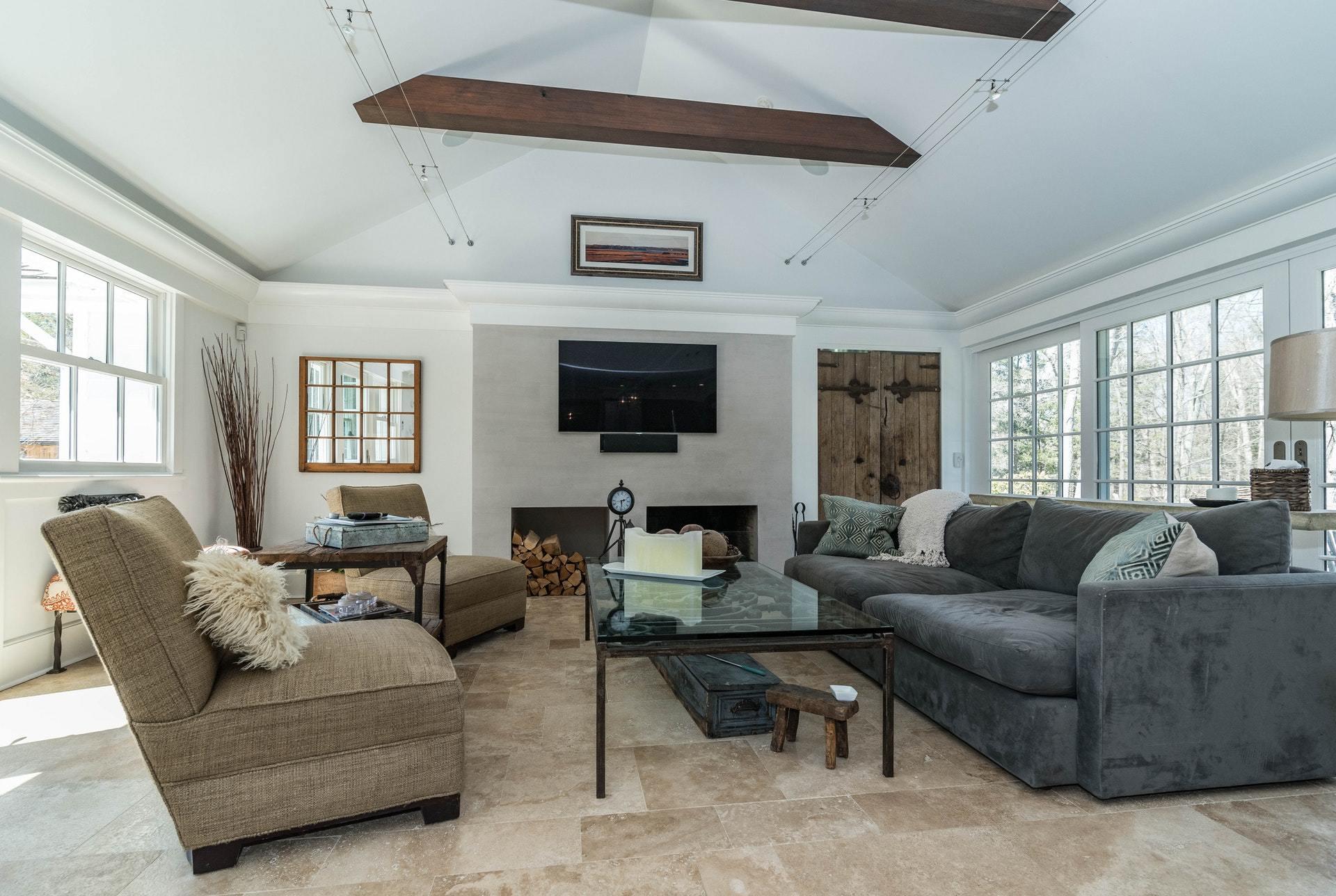 947 Valley Road New Canaan, CT 06840 - Photo 5 of 32 a living room with furniture and a flat screen tv