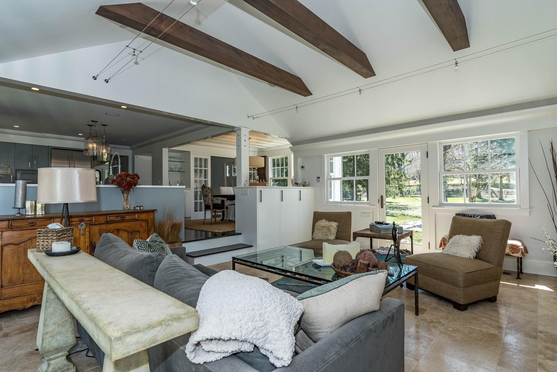 947 Valley Road New Canaan, CT 06840 - Photo 7 of 32 a living room with furniture and a large window