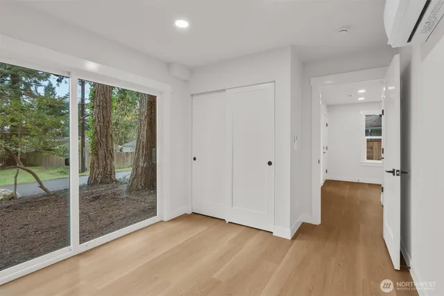 a view of livingroom with furniture and floor to ceiling window