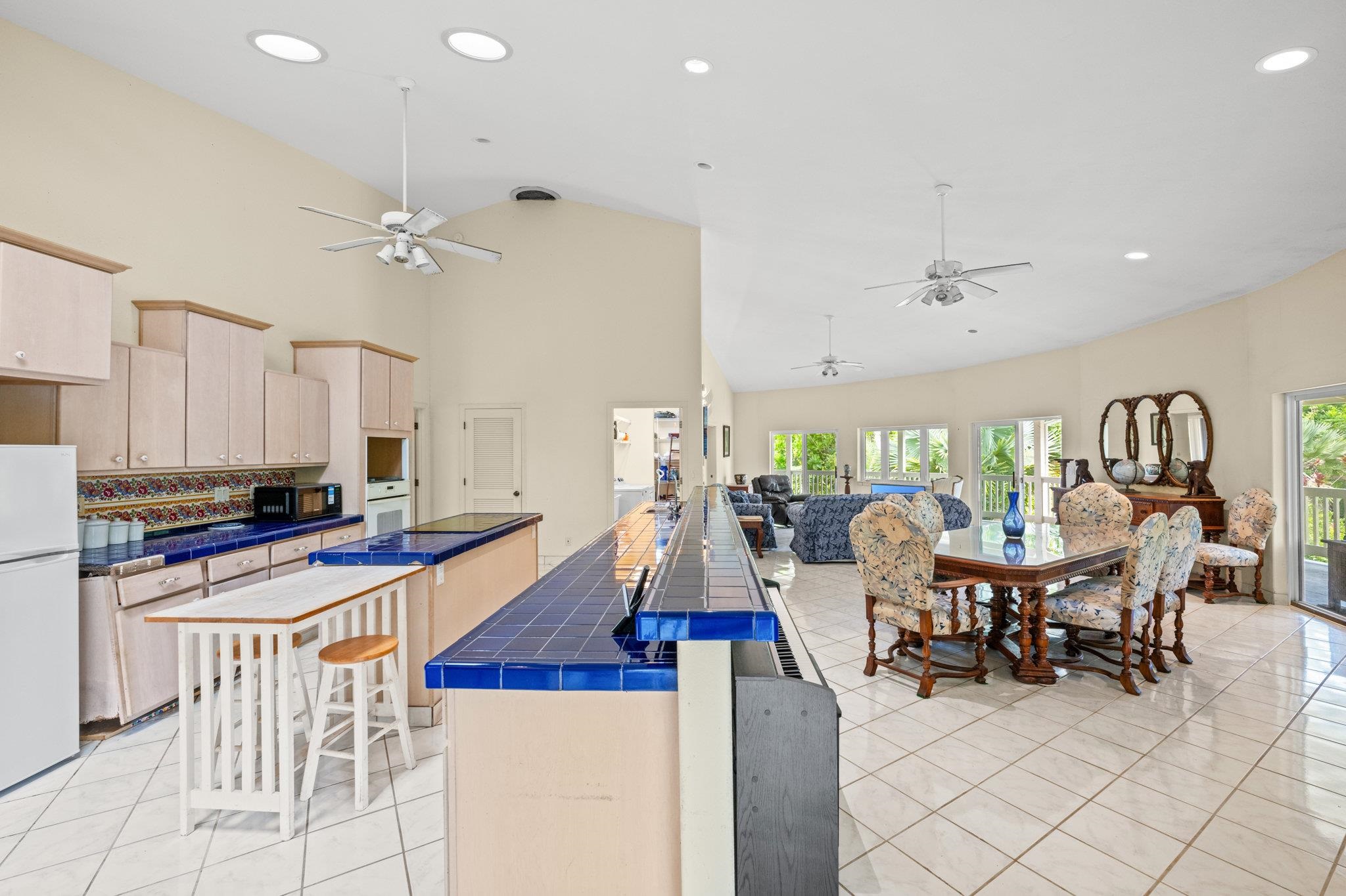 155 Uwala Road Hana, HI 96713 - Photo 13 of 41 a very nice looking kitchen with dining room and wooden floor