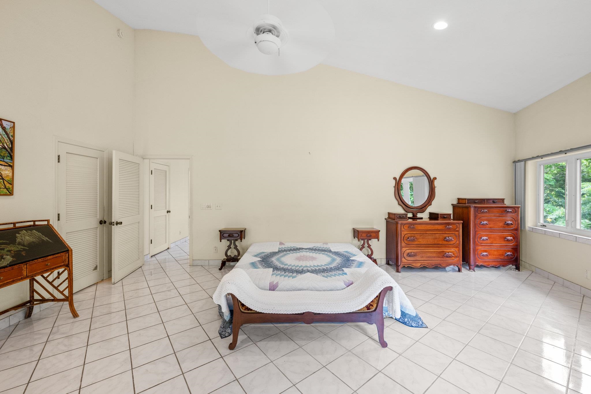 155 Uwala Road Hana, HI 96713 - Photo 16 of 41 a living room with furniture a rug and a window
