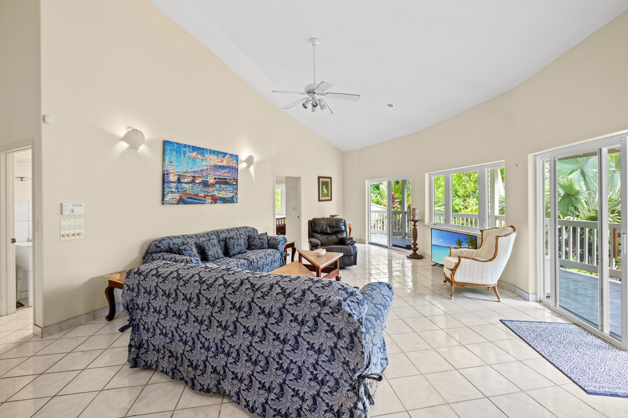 155 Uwala Road Hana, HI 96713 - Photo 5 of 41 a living room with furniture and a large window
